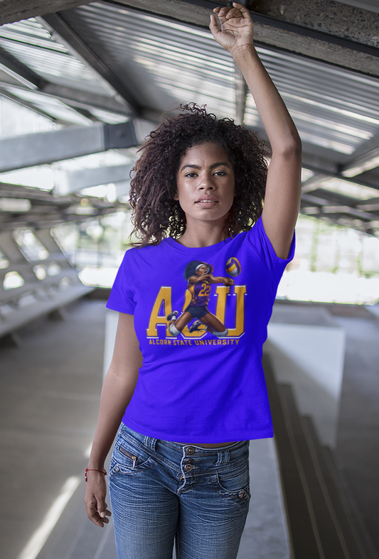 Woman wearing a purple t-shirt with a graphic design, standing on a bridge.